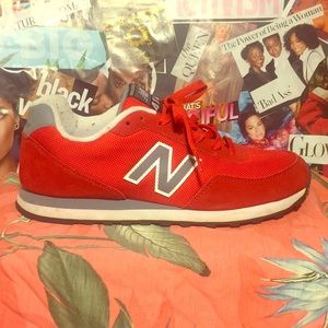 Red New Balance sneakers. Size 9 men’s, lady’s 11.